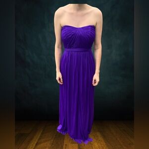 Formal Dress from David’s Bridal. Purple and can be worn different ways.